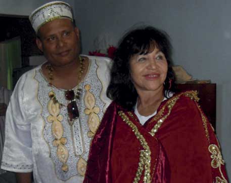 Zaida del Rio in Guines, wrapped in the cloak of Santa Barbara