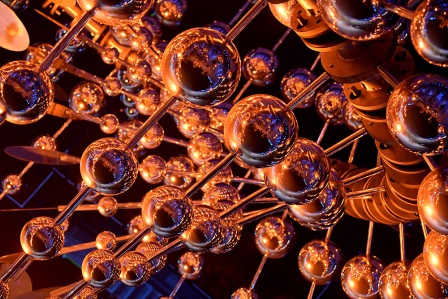 The Olympic flame and cauldron is reflected in Anthony Howe’s sculpture during the Opening Ceremony of the Rio 2016 Olympic Games at Maracana Stadium. Courtesy of Richard Heathcote/Getty Images.
