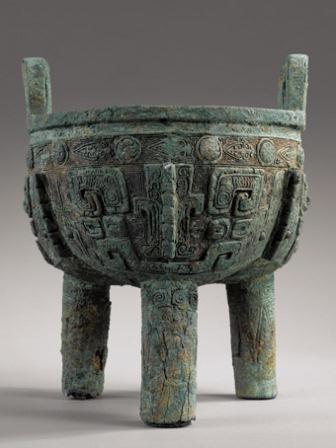A rare large archaic bronze ritual food vessel. Ding. late Shang Dynasty. Anyang phase. ca. 1200 BC.
