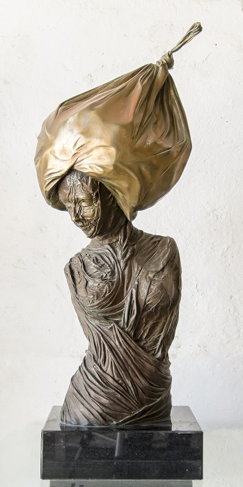 Osmany Betancourt. Mujer con sombrero