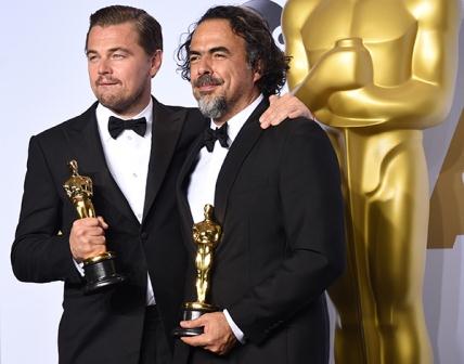 Actor Leonardo DiCaprio and director Alejandro González Iñárritu pose with their Best Actor and Best Director Oscars for The Revenant in the press room during the 88th Annual Academy Awards at Loews Hollywood Hotel on February 28, 2016 in Hollywood, California. Photo: Jason Merritt/Getty Images.