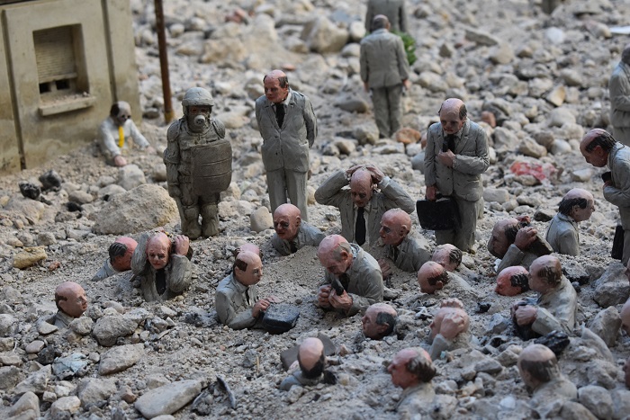  Detail of "Following the leader", by Isaac Cordal