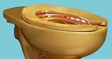 Maurizio Cattelan Creates Solid Gold Toilet for the Guggenheim