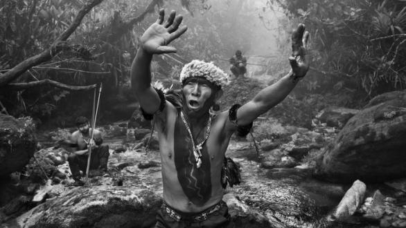 © Sebastião Salgado. Yanomami shaman interacts with spirits before an ascent to Pico da Neblina. State of Amazonas, Brazil, 2014