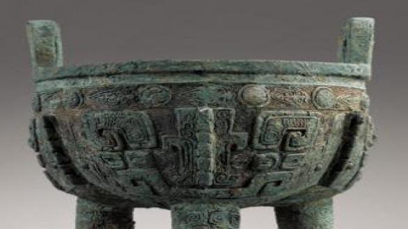 A rare large archaic bronze ritual food vessel. Ding. late Shang Dynasty. Anyang phase. ca. 1200 BC.